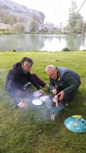 Larry and George Lamb cooking a fish at Kilnsey Park Estate in the Yorkshire Dales