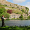 Image showing a fisherman at Kilnsey Park fishing lakes in the Yorkshire Dales.